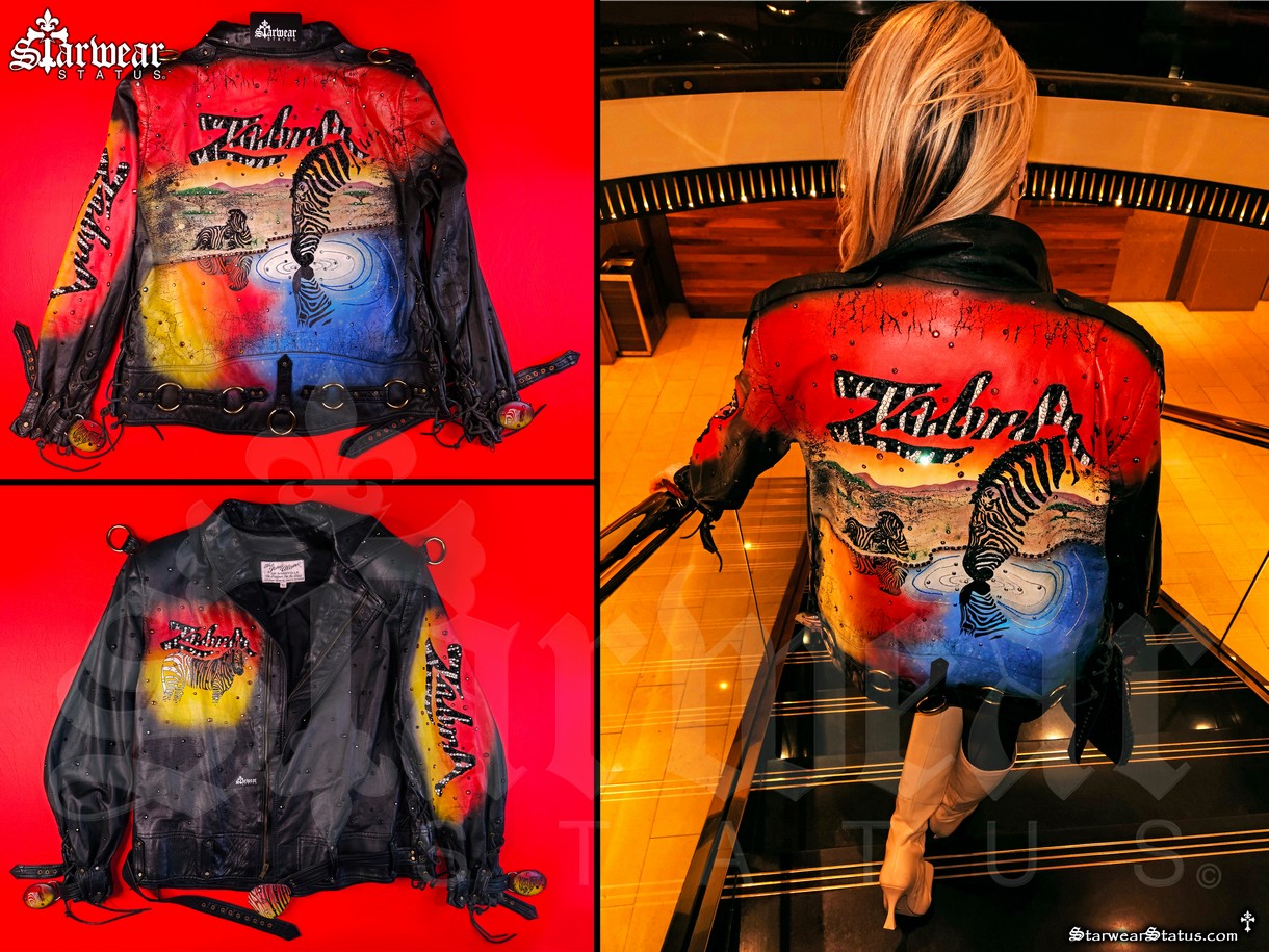 Vintage 1980s Tony Alamo leather motorcycle jacket owned by Michael Jackson featuring hand airbrushed zebra safari design, Swarovski crystal embellishments, and buckle details — one-of-a-kind collector’s piece.