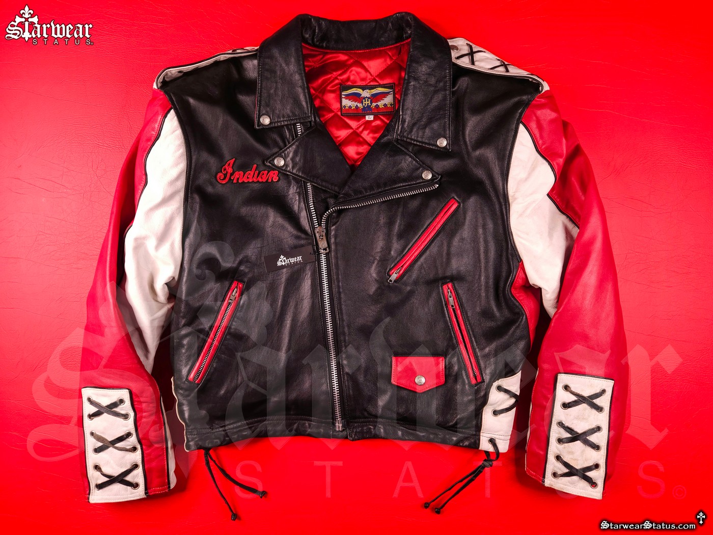 Vintage 1980s–1990s Jeff Hamilton leather biker jacket featuring Cherokee-inspired Indian Motorcycle design, leather tassels, and intricate embroidery; rare limited edition collectible in size M/L.